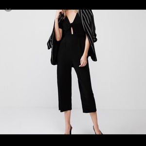 Express - Black tie-front jumpsuit.